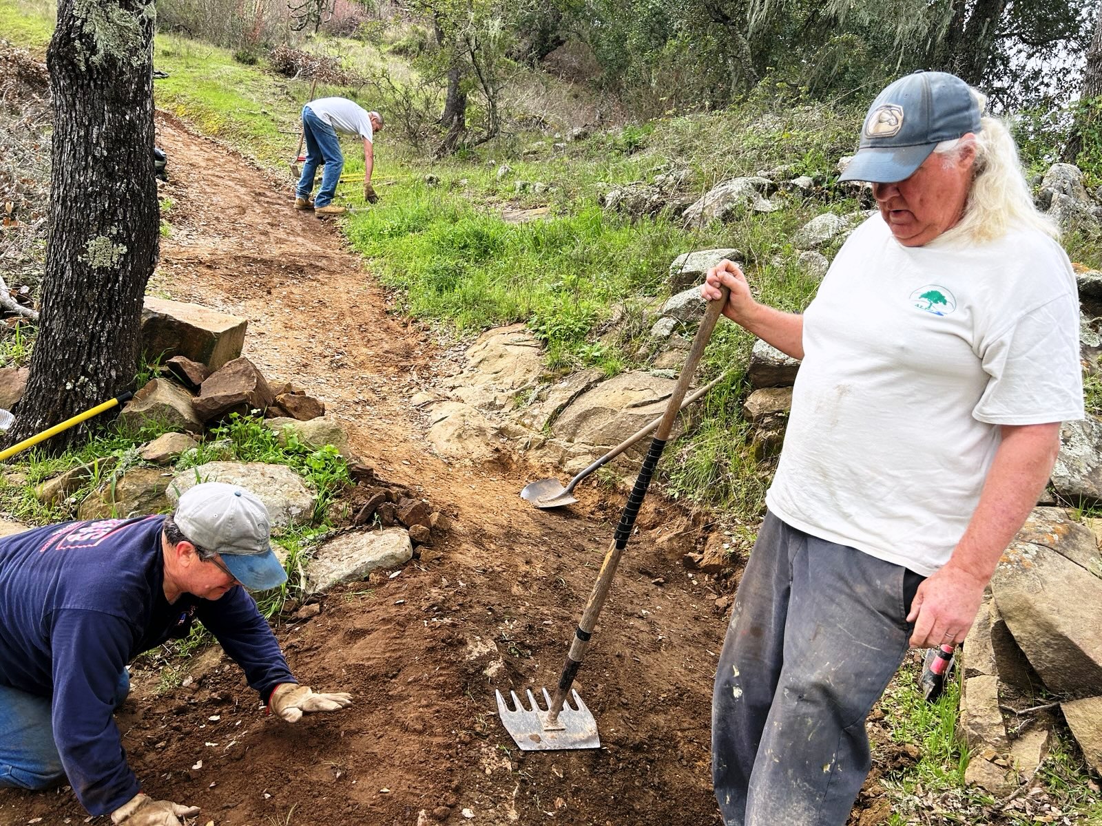 Mike, Phil and Dave putting the finishing touches on the switchback